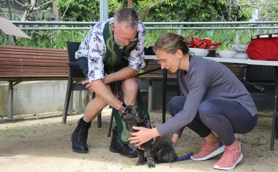 Chaplain, Scott Holmes, and Head of Youth, Elmina Joldic, with her dog, Billy.