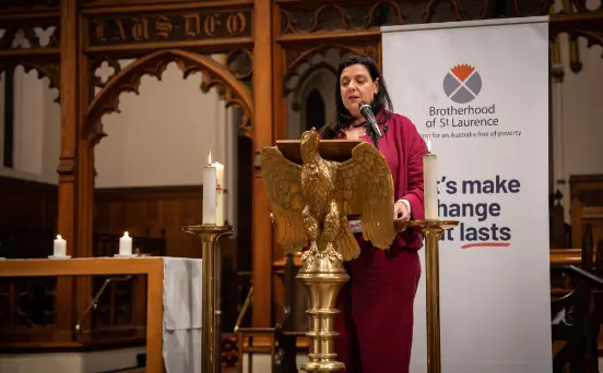 BSL chaplain Reverend Dr Michelle Trebilcock at the Tucker Oration, standing at the podium