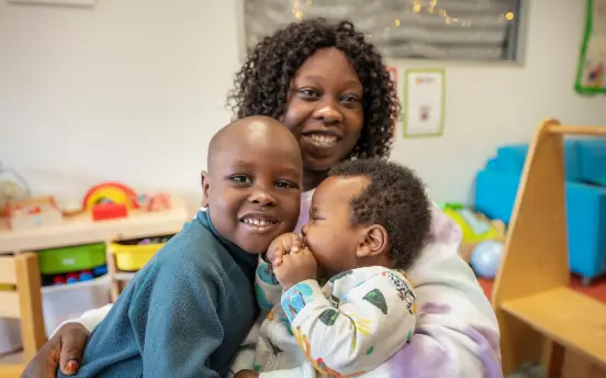 Ayel and her son Oliver (left) and Ken (right) enjoy playgroup