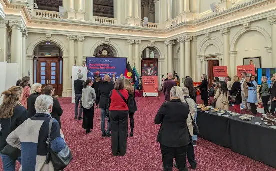 Right: BSL expo discussion in the Queen's Hall at Victoria's Parliament House